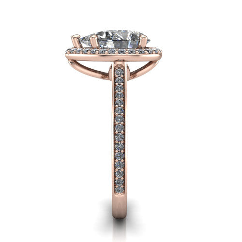 Delaney pear halo engagement ring in 18K Rose Gold, side profile showing the leaf basket and pave band