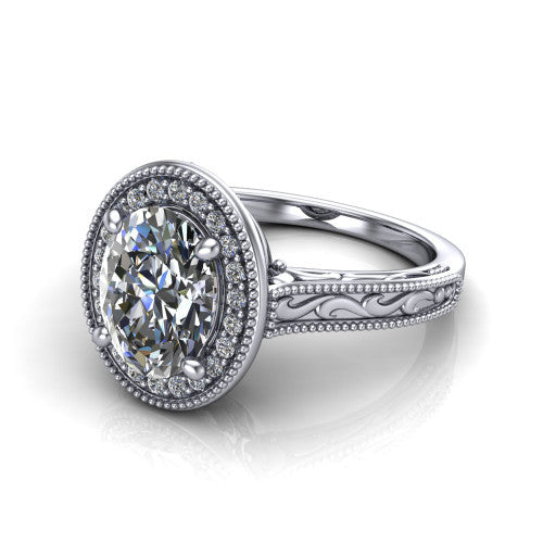Octavia oval vintage halo engagement ring in Platinum, three-quarter perspective showing the oval center diamond in a milgrain halo above an engraved band