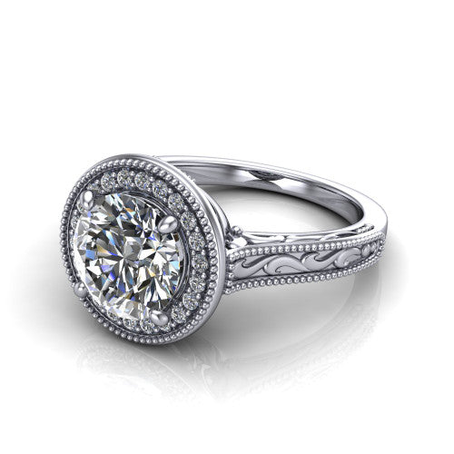 Octavia round vintage halo engagement ring in Platinum, three-quarter perspective showing the round center diamond in a milgrain halo above an engraved band