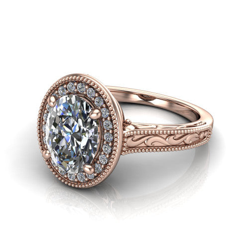 Octavia oval vintage halo engagement ring in 14K Rose Gold, three-quarter perspective showing the oval center diamond in a milgrain halo above an engraved band