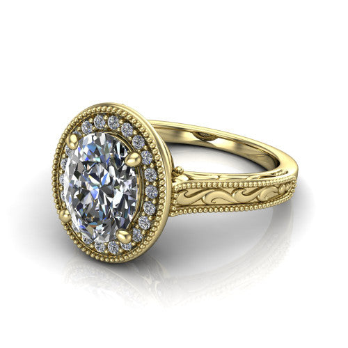 Octavia oval vintage halo engagement ring in 14K Yellow Gold, three-quarter perspective showing the oval center diamond in a milgrain halo above an engraved band