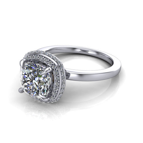 Angela cushion halo engagement ring in Platinum, three-quarter perspective showing the cushion center diamond in a double-row pave halo
