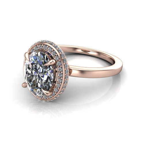 Angela oval halo engagement ring in 14K Rose Gold, three-quarter perspective showing the oval center diamond in a double-row pave halo