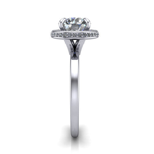Angela round halo engagement ring in Platinum, side profile showing the pave basket and polished shank