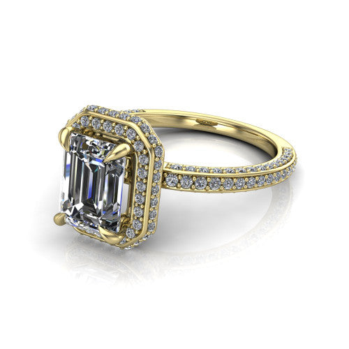 Malia emerald halo engagement ring in 18K Yellow Gold, three-quarter perspective showing the emerald center diamond in a pave halo above a pave band