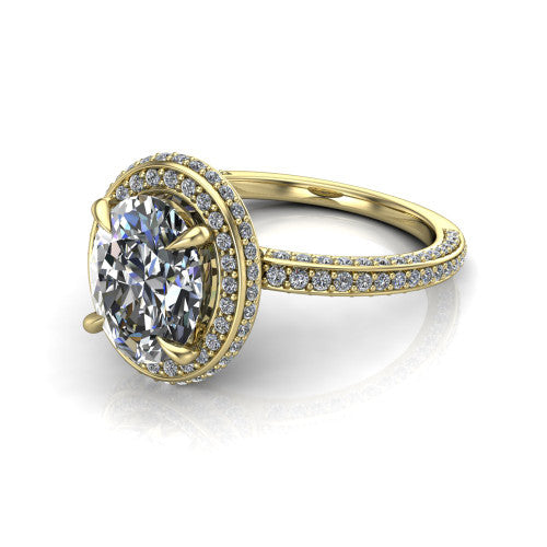 Malia oval halo engagement ring in 18K Yellow Gold, three-quarter perspective showing the oval center diamond in a pave halo above a pave band
