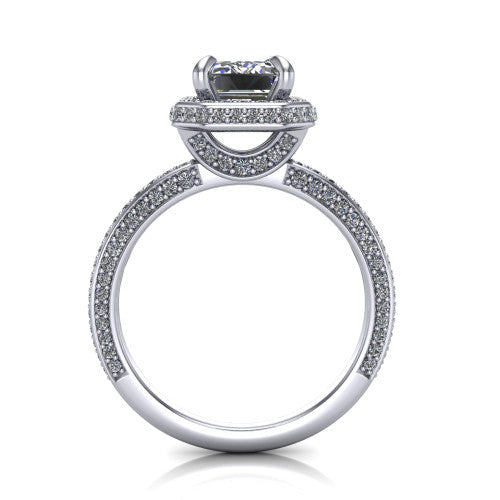 Malia emerald halo engagement ring in Platinum, through-finger front profile showing the hidden halo and pave band