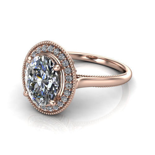 Lilly oval halo engagement ring in 14K Rose Gold, three-quarter perspective showing the oval center diamond in a milgrain pave halo above a milgrain band
