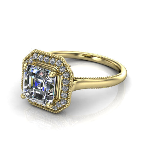 Lilly square emerald-cut halo engagement ring in 18K Yellow Gold, three-quarter perspective showing the square emerald-cut center diamond in a milgrain pave halo above a milgrain band