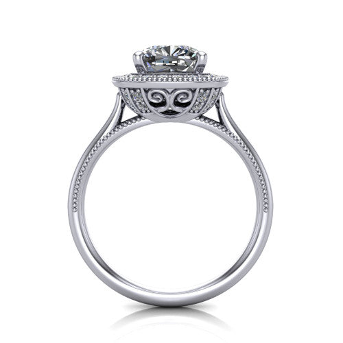 Lilly cushion halo engagement ring in Platinum, through-finger front profile showing the filigree gallery and milgrain halo from the front