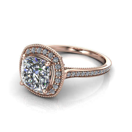 Diana cushion halo engagement ring in 14K Rose Gold, three-quarter perspective showing the cushion center diamond in a milgrain pave halo above a pave band