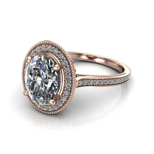 Diana oval halo engagement ring in 14K Rose Gold, three-quarter perspective showing the oval center diamond in a milgrain pave halo above a pave band