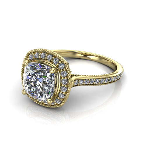 Diana cushion halo engagement ring in 14K Yellow Gold, three-quarter perspective showing the cushion center diamond in a milgrain pave halo above a pave band
