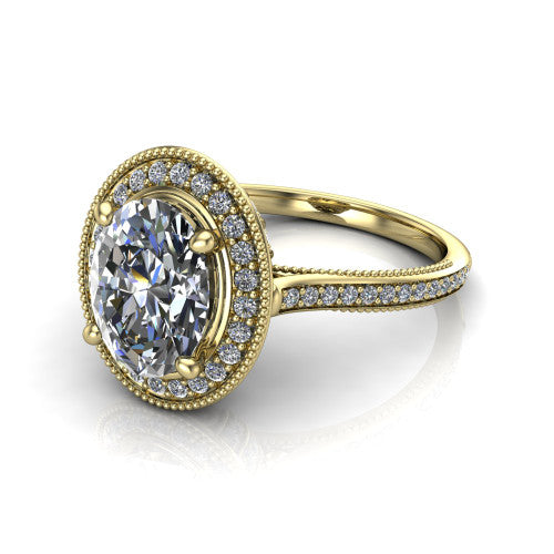 Diana oval halo engagement ring in 14K Yellow Gold, three-quarter perspective showing the oval center diamond in a milgrain pave halo above a pave band