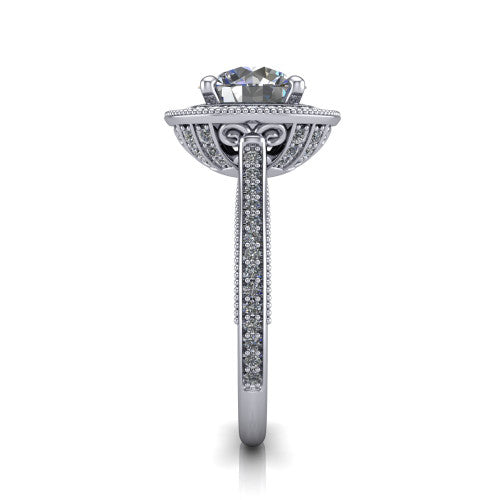 Diana round halo engagement ring in Platinum, side profile showing the filigree gallery and pave band in side view