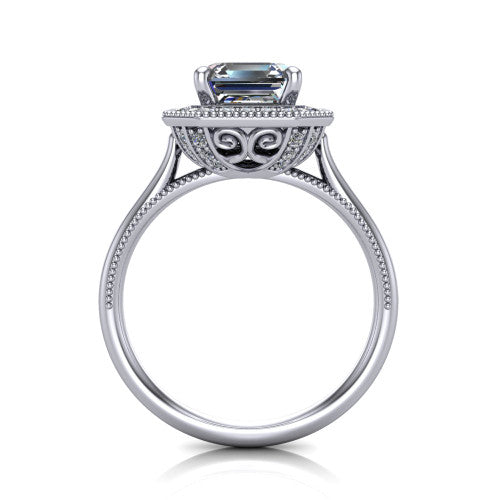 Diana square emerald-cut halo engagement ring in Platinum, through-finger front profile showing the filigree gallery and halo from the front