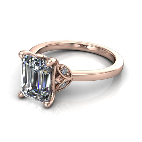 Lola emerald solitaire engagement ring in 14K Rose Gold, three-quarter perspective showing the emerald center diamond above a polished band