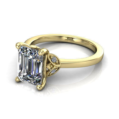 Lola emerald solitaire engagement ring in 14K Yellow Gold, three-quarter perspective showing the emerald center diamond above a polished band