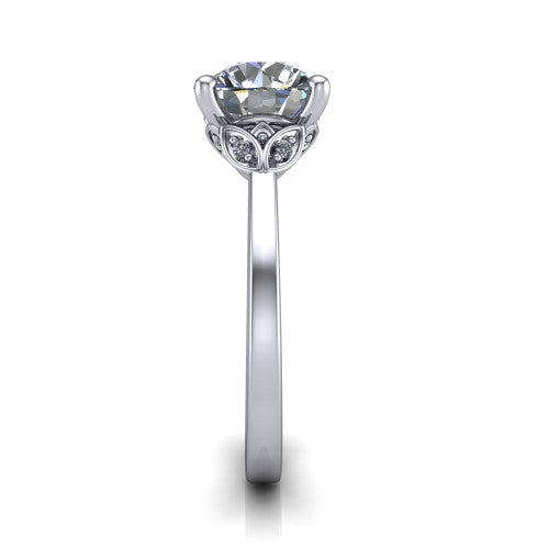 Lola round solitaire engagement ring in 14K White Gold, side profile showing the petal basket and polished band