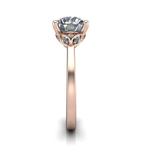 Lola round solitaire engagement ring in 14K Rose Gold, side profile showing the petal basket and polished band