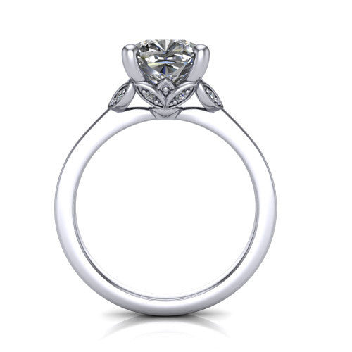 Lola cushion solitaire engagement ring in Platinum, through-finger front profile showing the petal-design basket