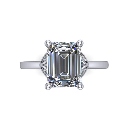 Lola emerald solitaire engagement ring in Platinum, top-down view showing the four-prong emerald center diamond