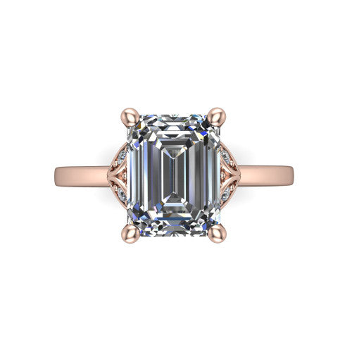 Lola emerald solitaire engagement ring in 18K Rose Gold, top-down view showing the four-prong emerald center diamond