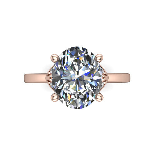 Lola oval solitaire engagement ring in 18K Rose Gold, top-down view showing the four-prong oval center diamond