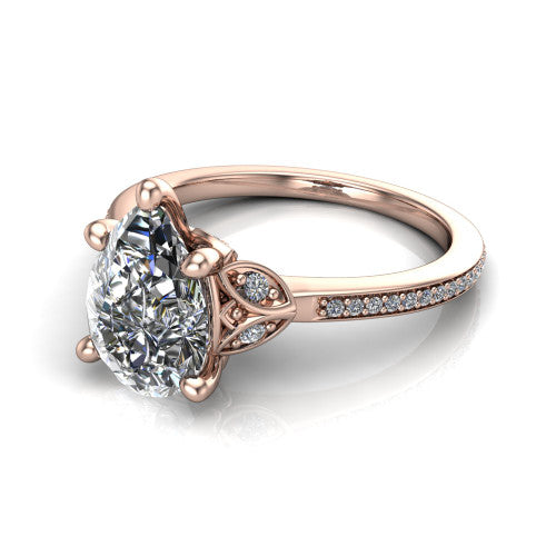 Lena pear solitaire engagement ring in 14K Rose Gold, three-quarter perspective showing the pear center diamond above a pave band