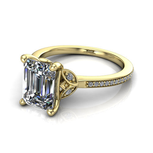 Lena emerald solitaire engagement ring in 18K Yellow Gold, three-quarter perspective showing the emerald center diamond above a pave band