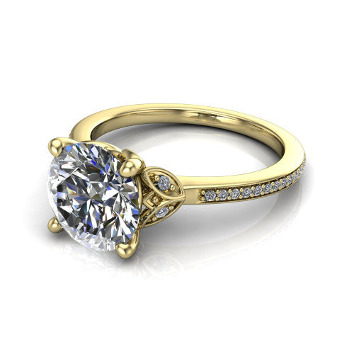 Lena round solitaire engagement ring in 18K Yellow Gold, three-quarter perspective showing the round center diamond above a pave band
