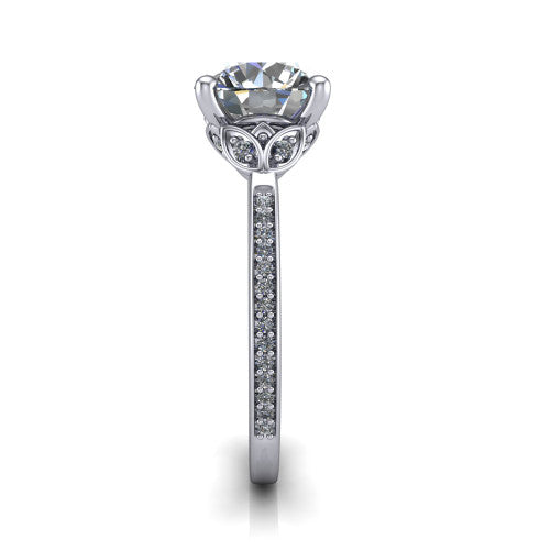 Lena round solitaire engagement ring in 18K White Gold, side profile showing the petal basket and pave band