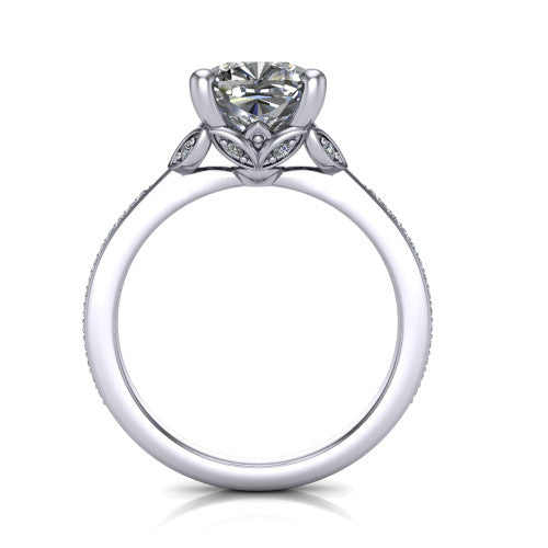 Lena cushion solitaire engagement ring in Platinum, through-finger front profile showing the petal-inspired basket