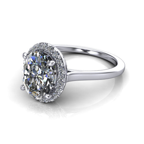 Dakota oval halo engagement ring in 14K White Gold, three-quarter perspective showing the oval center diamond in a pave halo above a polished band
