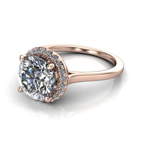 Dakota round halo engagement ring in 14K Rose Gold, three-quarter perspective showing the round center diamond in a pave halo above a polished band