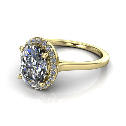 Dakota oval halo engagement ring in 18K Yellow Gold, three-quarter perspective showing the oval center diamond in a pave halo above a polished band
