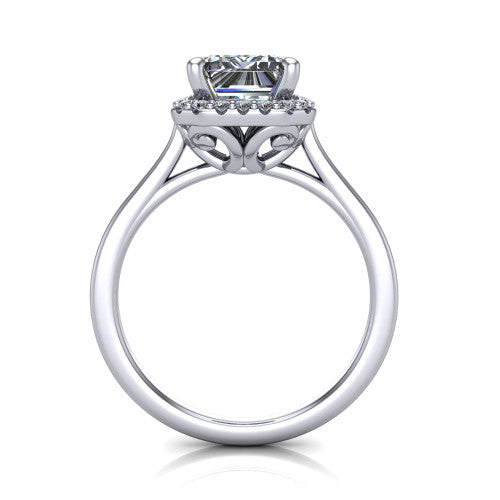 Dakota emerald halo engagement ring in Platinum, through-finger front profile showing the scrollwork openwork basket