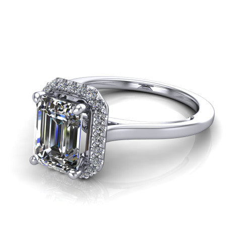 Makenzie emerald halo engagement ring in 14K White Gold, three-quarter perspective showing the emerald center diamond in a pave halo on a thin polished band