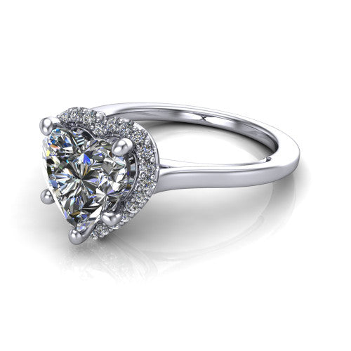 Makenzie heart halo engagement ring in Platinum, three-quarter perspective showing the heart center diamond in a pave halo on a thin polished band