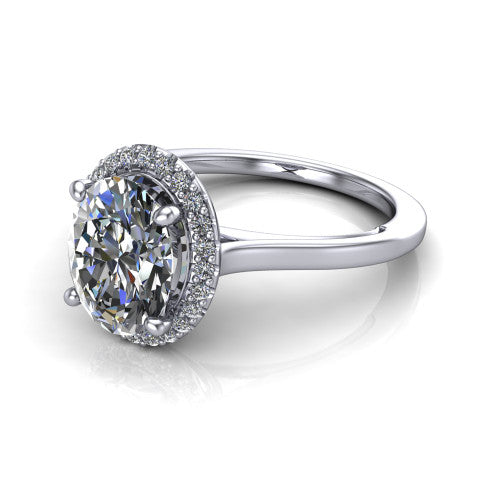 Makenzie oval halo engagement ring in 14K White Gold, three-quarter perspective showing the oval center diamond in a pave halo on a thin polished band