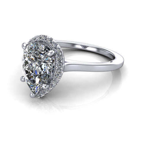 Makenzie pear halo engagement ring in 14K White Gold, three-quarter perspective showing the pear center diamond in a pave halo on a thin polished band