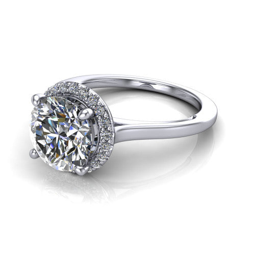 Makenzie round halo engagement ring in 14K White Gold, three-quarter perspective showing the round center diamond in a pave halo on a thin polished band