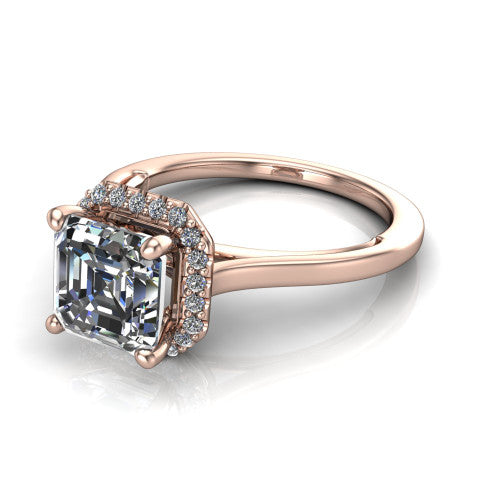 Makenzie square emerald halo engagement ring in 18K Rose Gold, three-quarter perspective showing the square emerald center diamond in a pave halo on a thin polished band