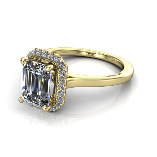 Makenzie emerald halo engagement ring in 18K Yellow Gold, three-quarter perspective showing the emerald center diamond in a pave halo on a thin polished band