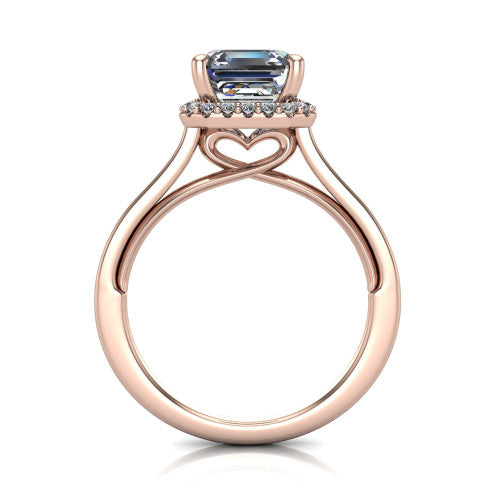 Makenzie square emerald halo engagement ring in 18K Rose Gold, through-finger front profile showing the hidden heart in the gallery