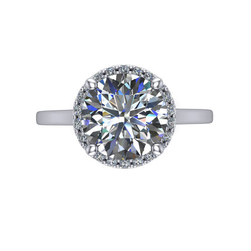 Makenzie round halo engagement ring in 18K White Gold, top-down view showing the round center diamond framed by a pave halo