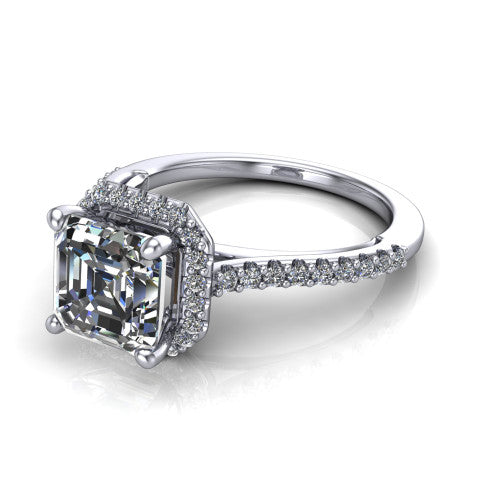 Palmer square emerald halo engagement ring in Platinum, three-quarter perspective showing the square emerald center diamond in a pave halo above a pave band