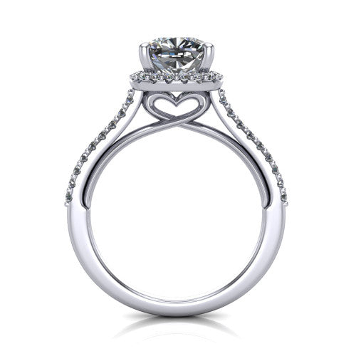 Palmer cushion halo engagement ring in Platinum, through-finger front profile showing the concealed heart in the basket