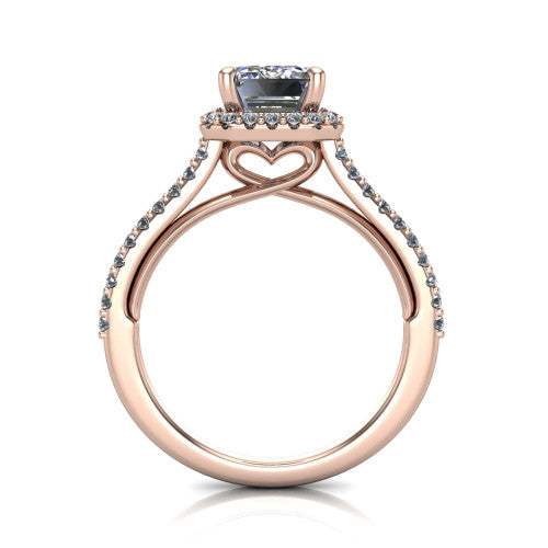 Palmer emerald halo engagement ring in 18K Rose Gold, through-finger front profile showing the concealed heart in the basket