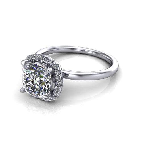 Calista cushion halo engagement ring in 18K White Gold, three-quarter perspective showing the cushion center diamond in a square pave halo with split-claw prongs
